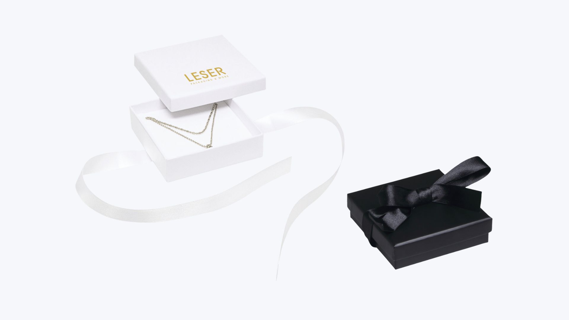 Serie 0276 LOOP.<br>Onze kartonnen dozen met schuifband. Serie 0276 LOOP.<br>Onze kartonnen dozen met schuifband.